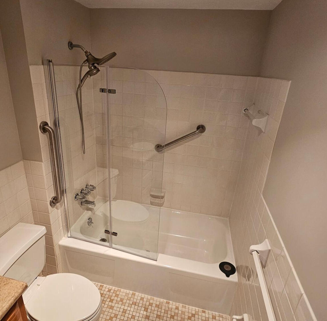 Bathroom upgraded with new fixtures and door